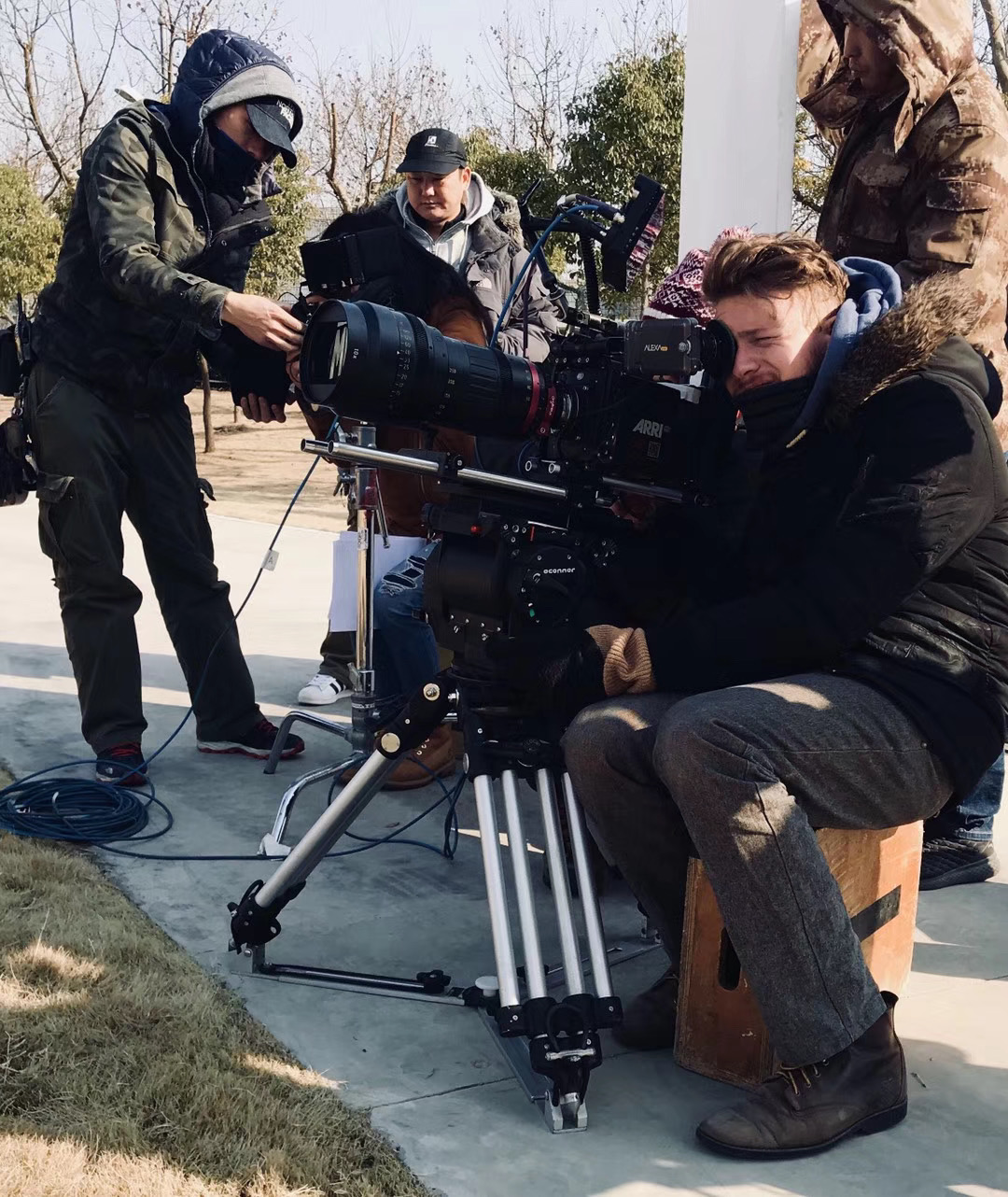 Thomas Gilbert operating a cinema camera on an outdoor commercial shoot