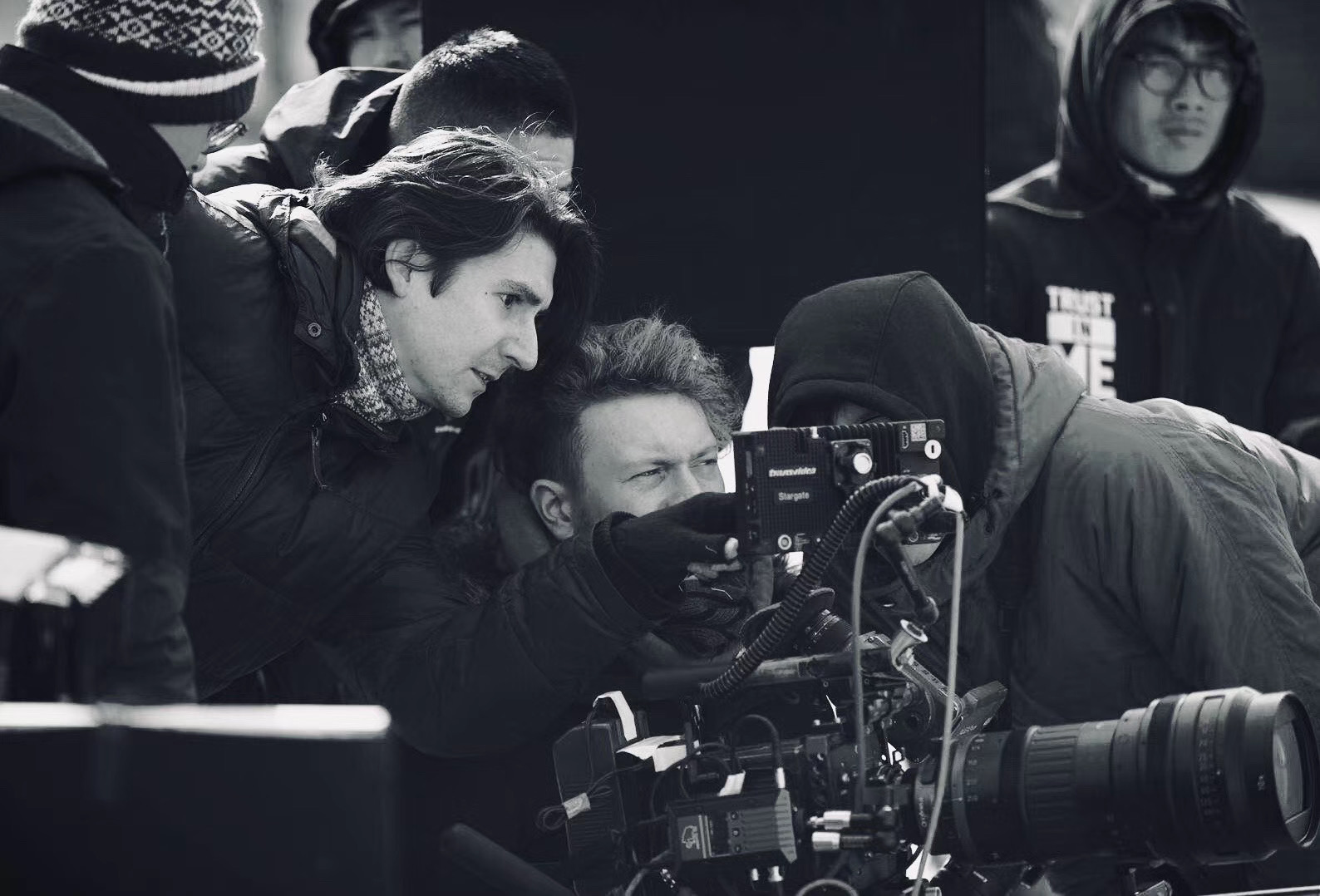 Thomas Gilbert and crew reviewing a cinema camera on a commercial shoot