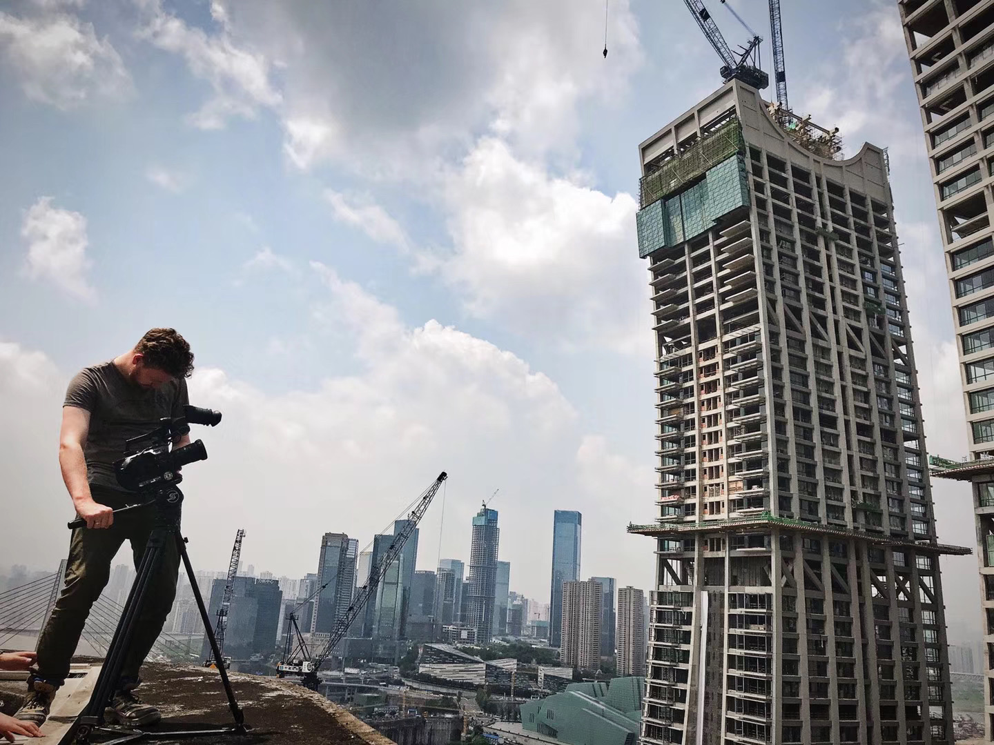 Thomas Gilbert filming at the Raffles City Chongqing construction site